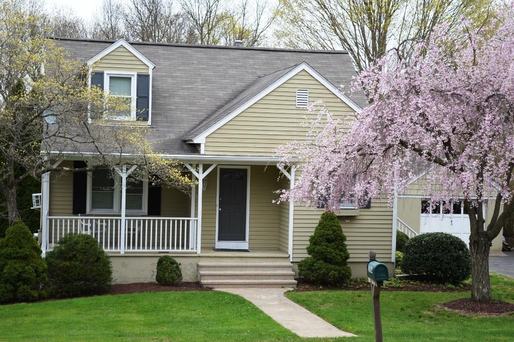 1936 North Benson Road Fairfield, CT 06824 - Photo 1 of 1 a front view of a house with a yard