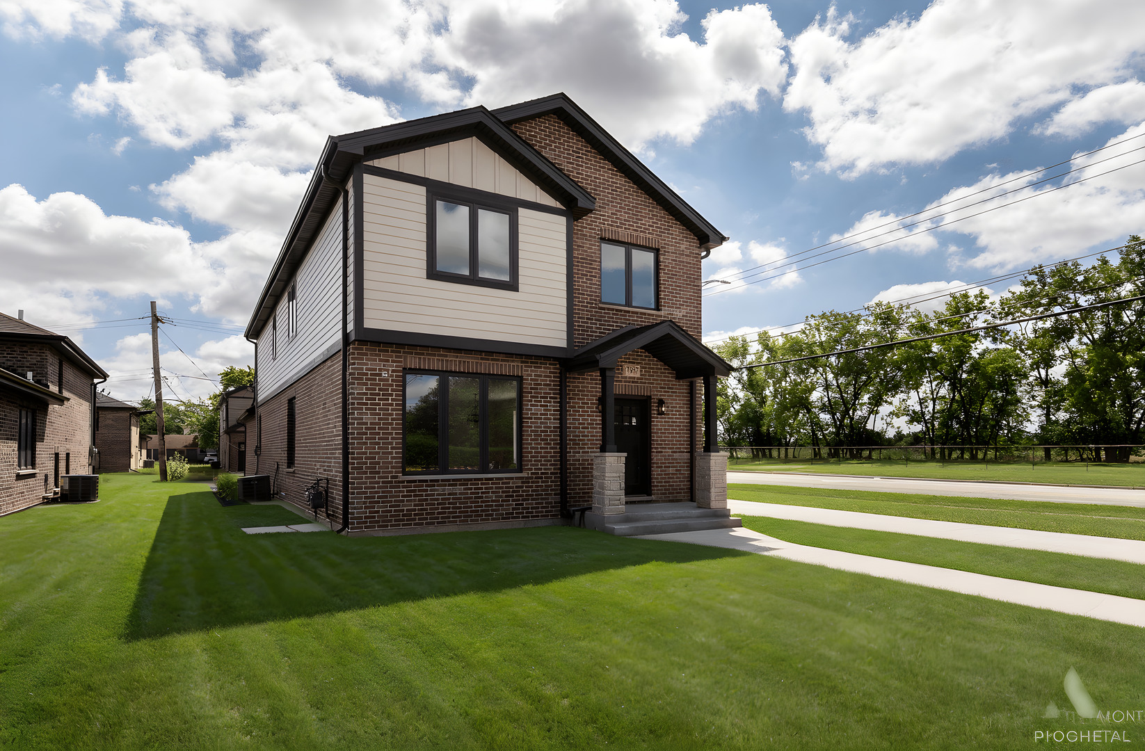 7957 West 73rd Place Bridgeview, IL 60455 - Photo 1 of 40 a front view of a house with a yard