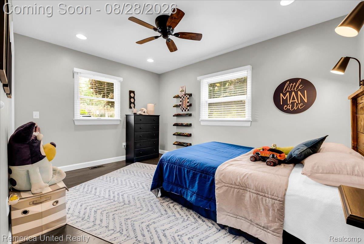 3687 Van Amberg Road Brighton, MI 48114 - Photo 19 of 56 Recessed lighting complements a ceiling fan with wood-finish blades