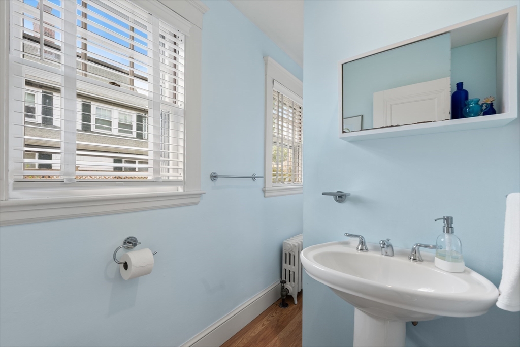8 Charlotte Road Marblehead, MA 01945 - Photo 16 of 37 a bathroom with a sink and a mirror