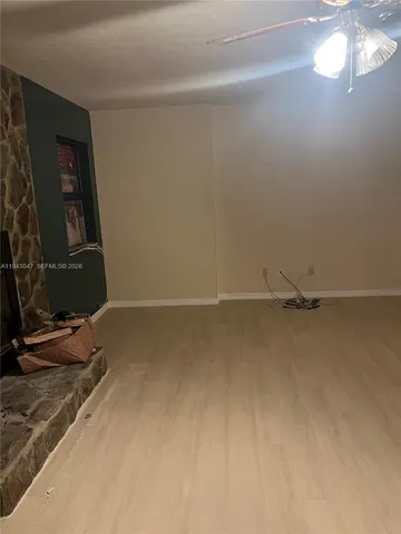 a view of a room with rack on the wall