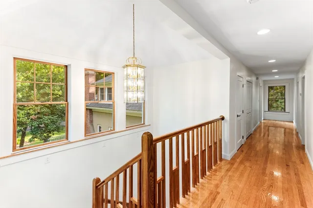 a view of hallway with windows