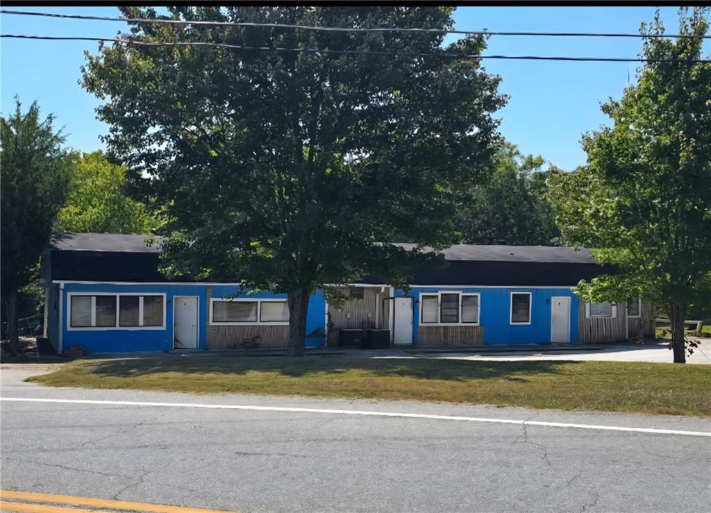 4540 Lee Road Southwest Snellville, GA 30039 - Photo 1 of 1 a view of house with a yard