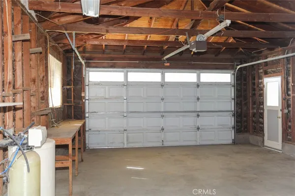 a view of a room with wooden walls