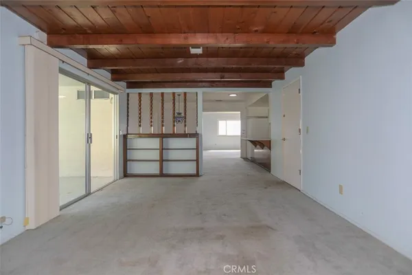a view of an empty room and window