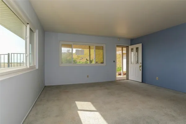 an empty room with windows