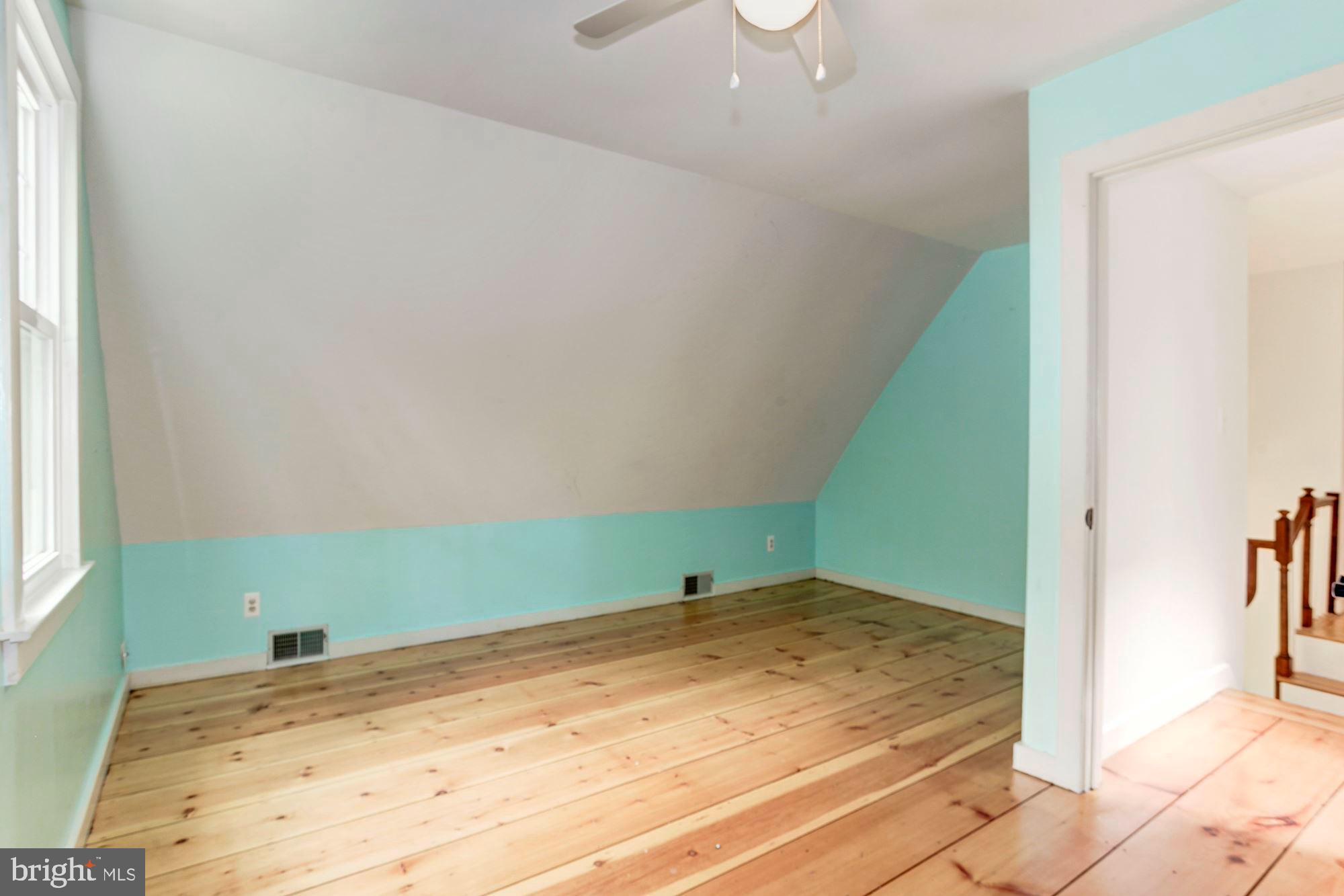4841 Occoquan Overlook Woodbridge, VA 22192 - Photo 18 of 28 Roomy upstairs bedrooms with hardwoods throughout