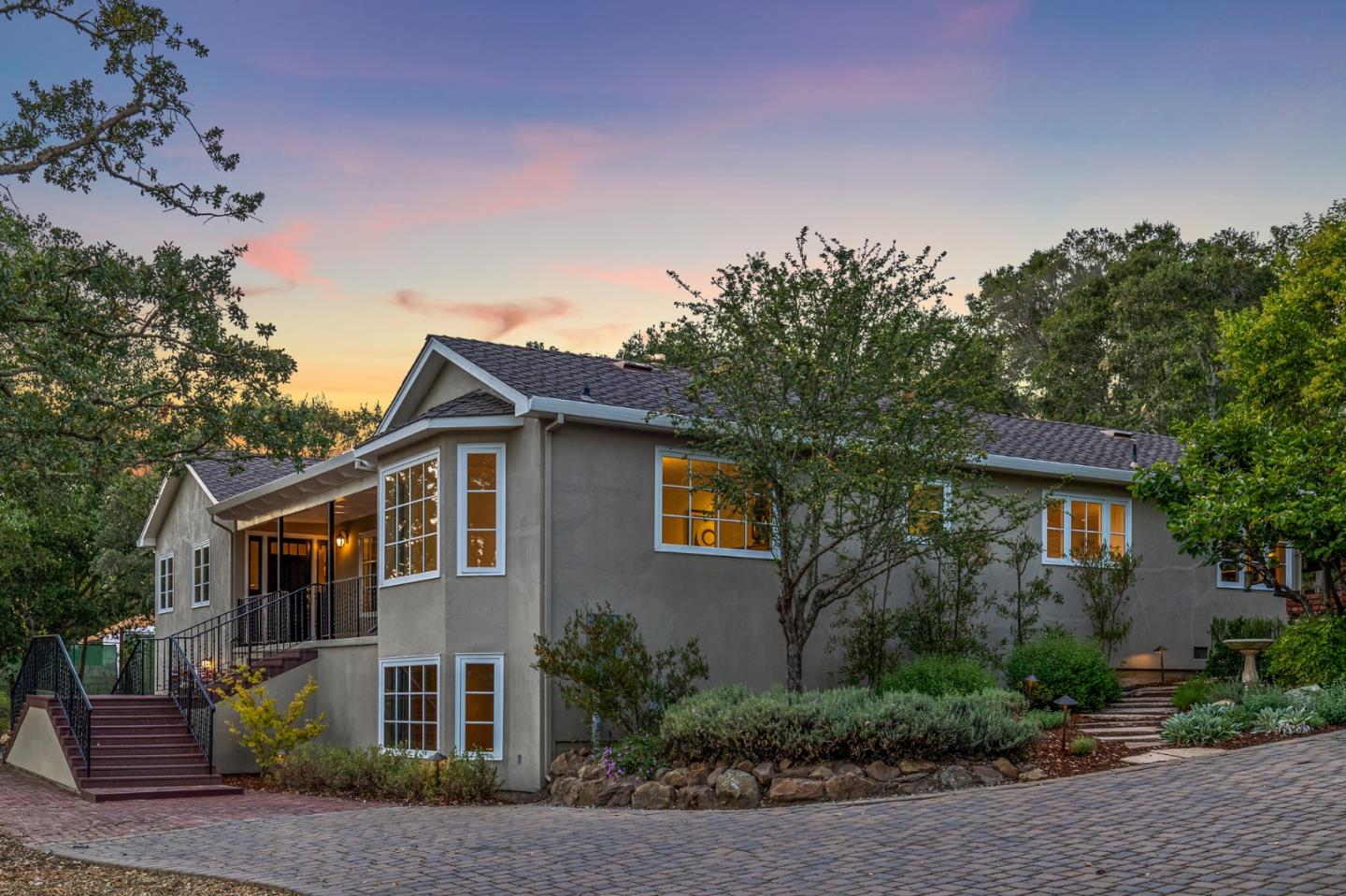 1585 Canada Lane Woodside, CA 94062 - Photo 1 of 46 a front view of a house with a yard and garage