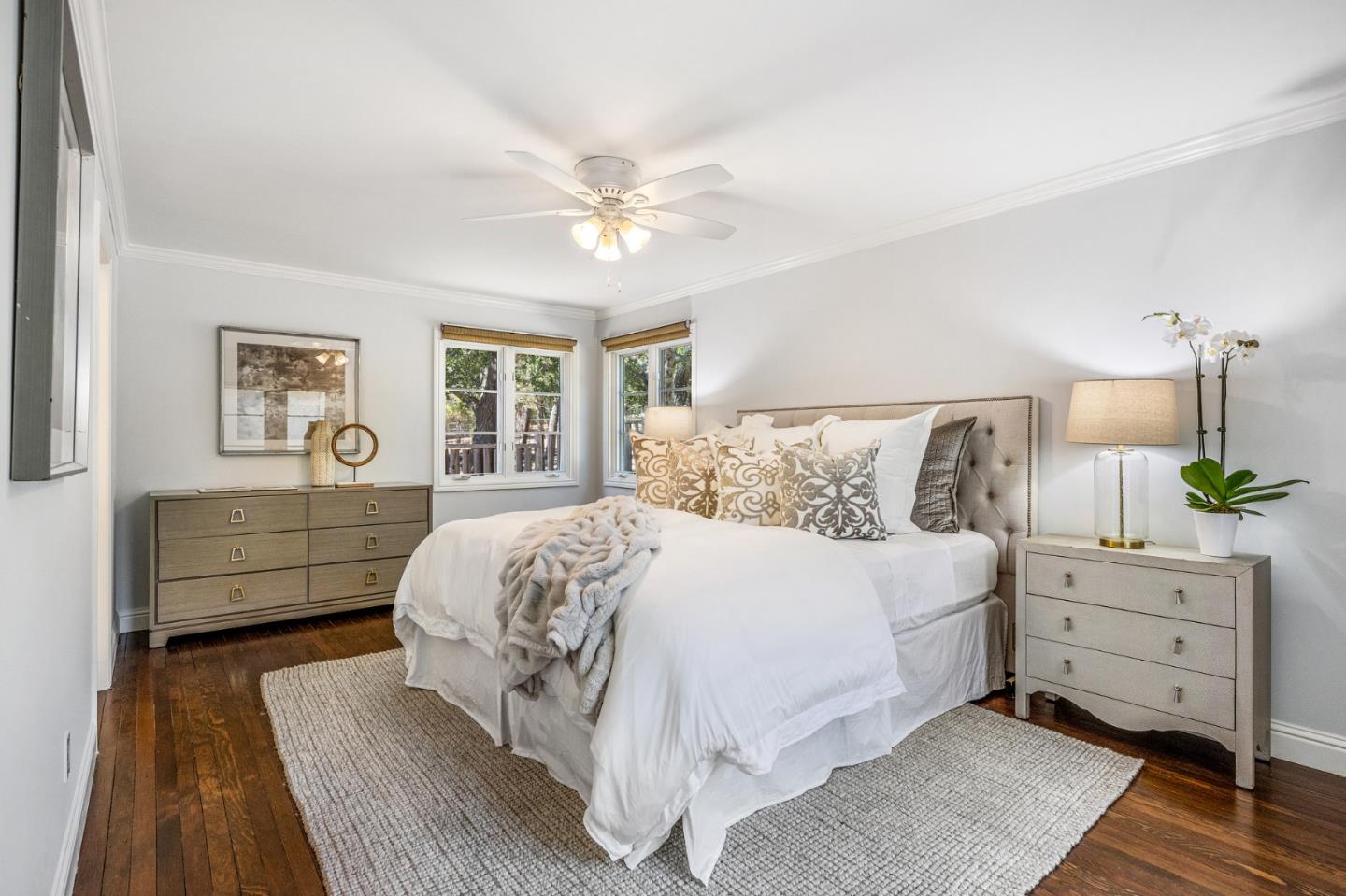 1585 Canada Lane Woodside, CA 94062 - Photo 21 of 46 a bedroom with a large bed and a window