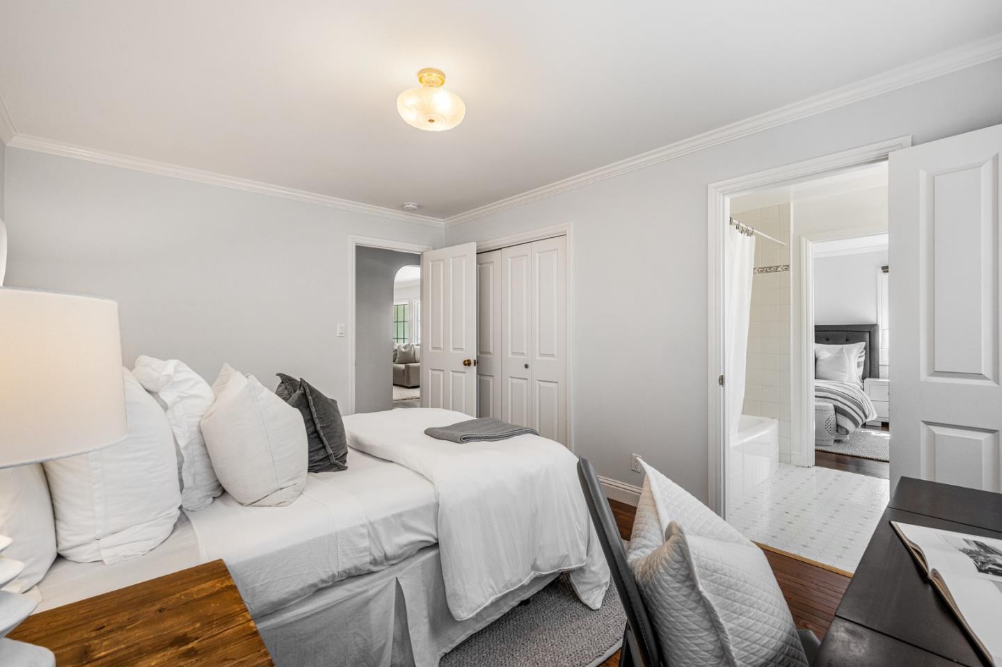 1585 Canada Lane Woodside, CA 94062 - Photo 23 of 46 a bedroom with a bed and a desk