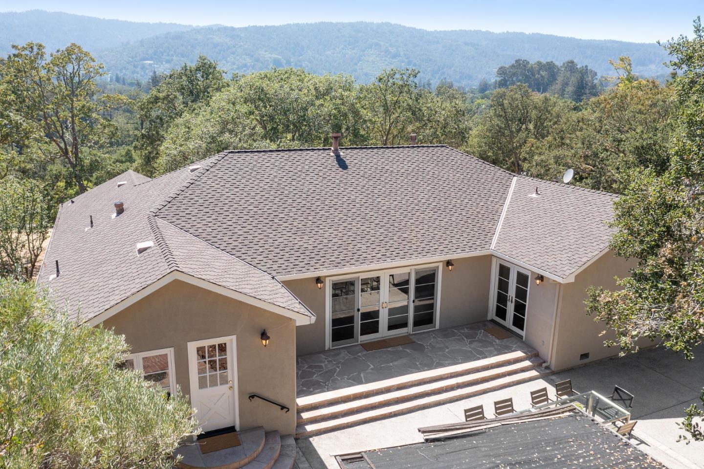 1585 Canada Lane Woodside, CA 94062 - Photo 26 of 46 an aerial view of a house with a yard