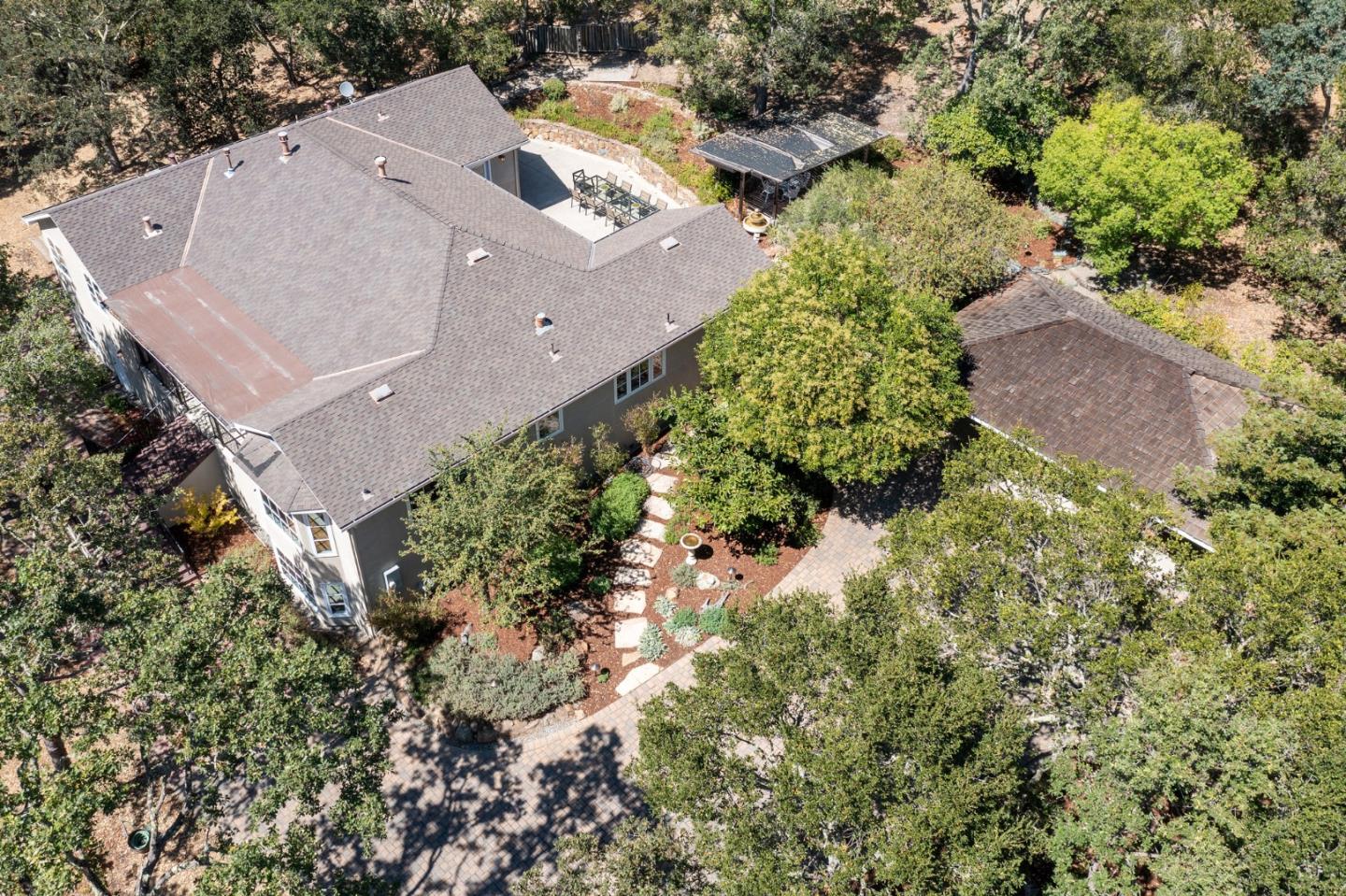 1585 Canada Lane Woodside, CA 94062 - Photo 3 of 46 an aerial view of a house with a yard and a large tree