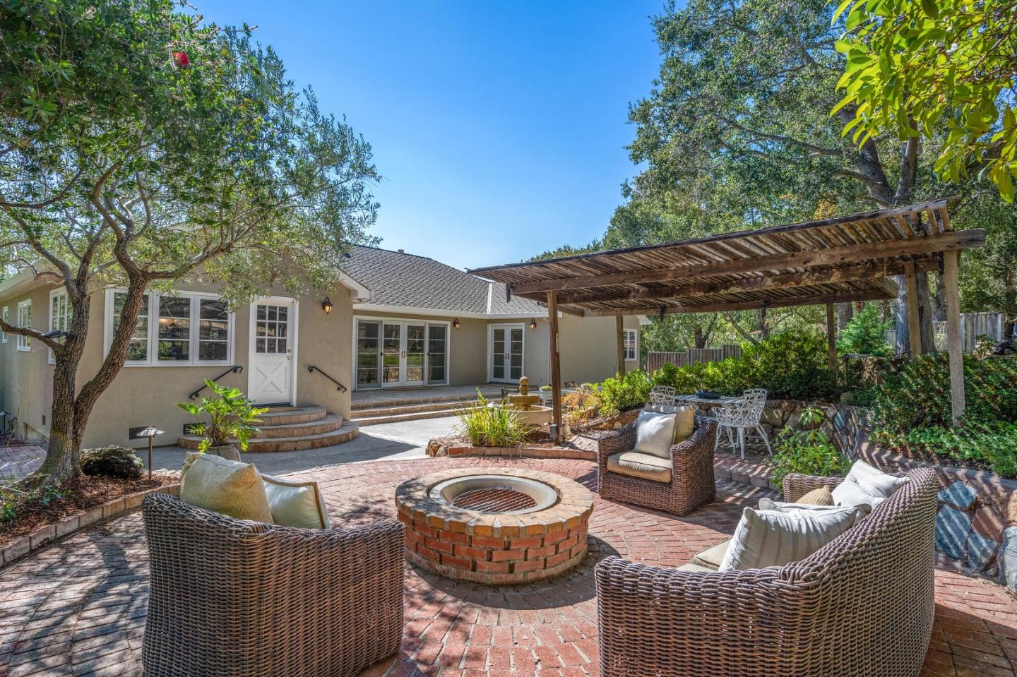 1585 Canada Lane Woodside, CA 94062 - Photo 32 of 46 a view of a house with backyard and sitting area