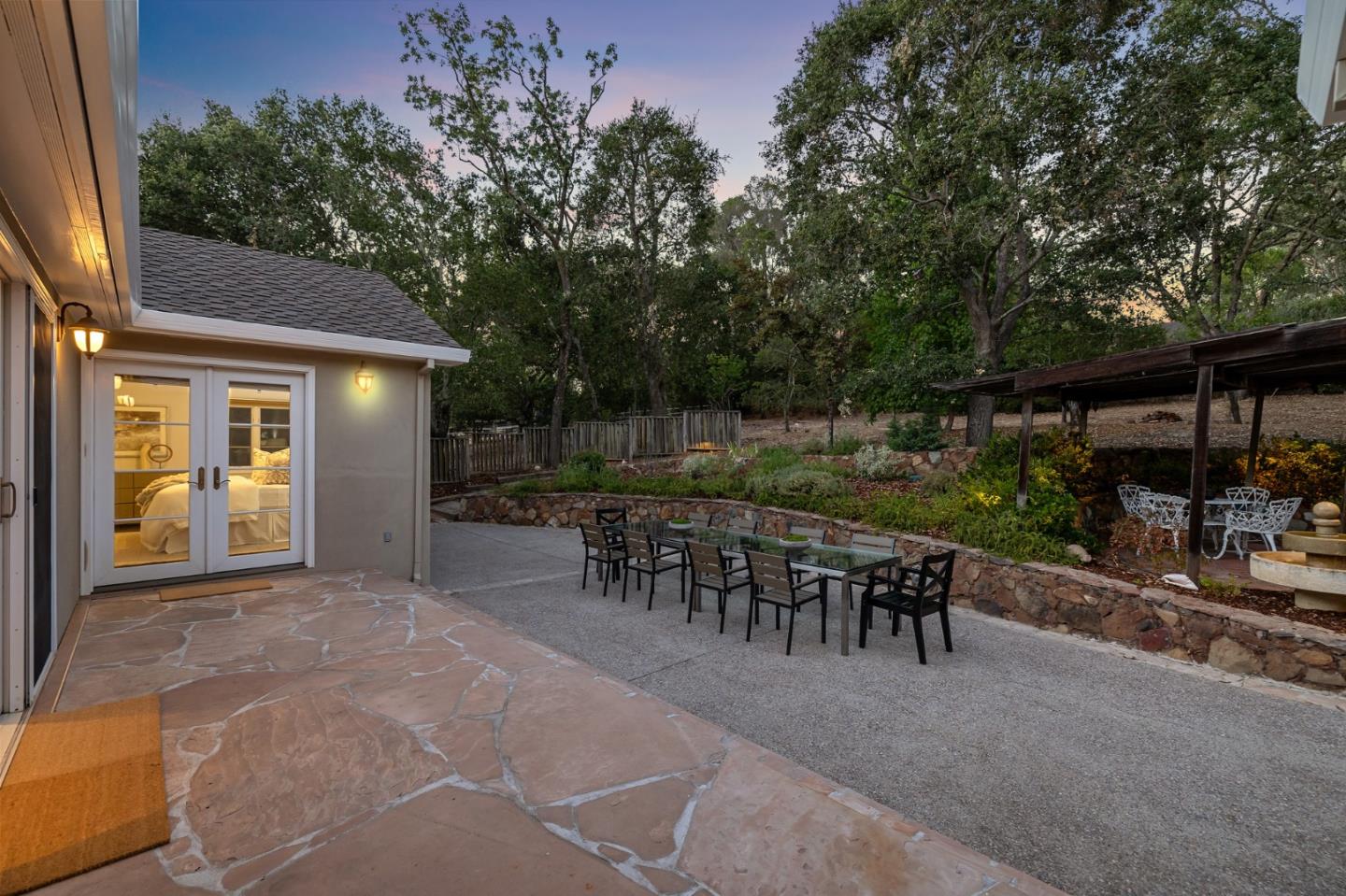 1585 Canada Lane Woodside, CA 94062 - Photo 36 of 46 a view of a backyard with sitting area and furniture