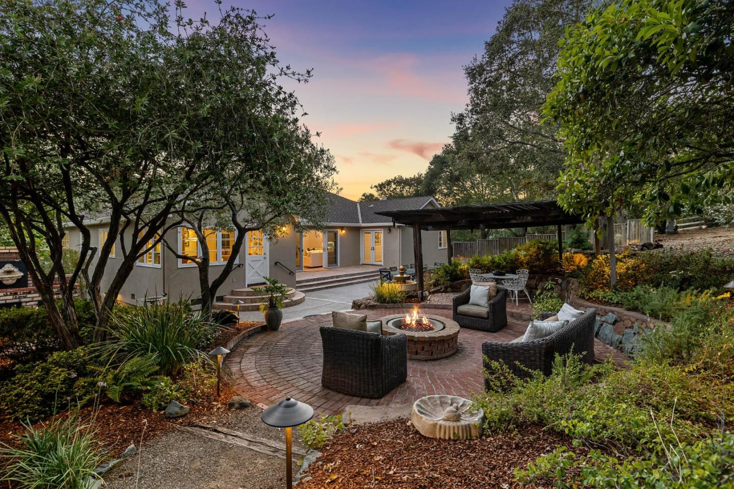 1585 Canada Lane Woodside, CA 94062 - Photo 38 of 46 a view of a patio with chairs and plants