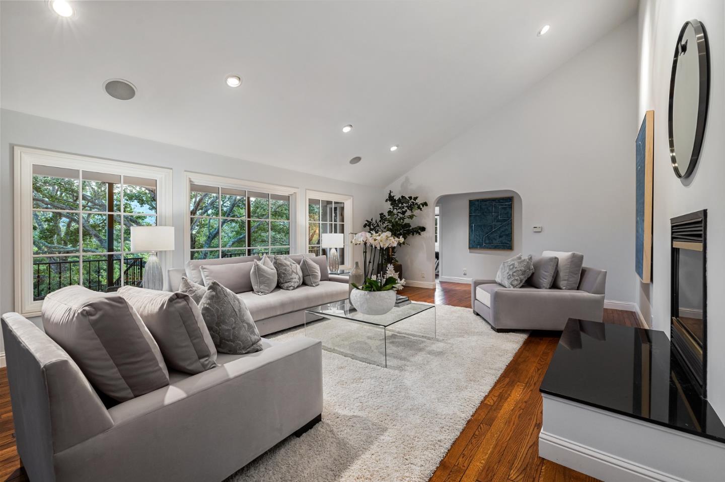 1585 Canada Lane Woodside, CA 94062 - Photo 5 of 46 a living room with furniture and a large window