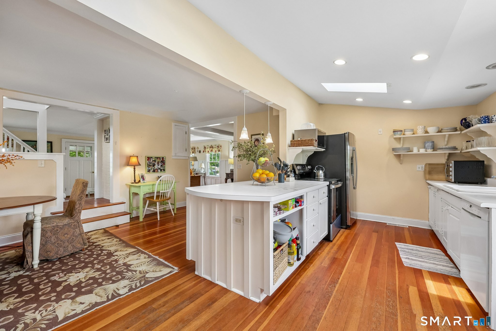 153 Middle Beach Road Madison, CT 06443 - Photo 10 of 40 Two skylights allow the light to stream in