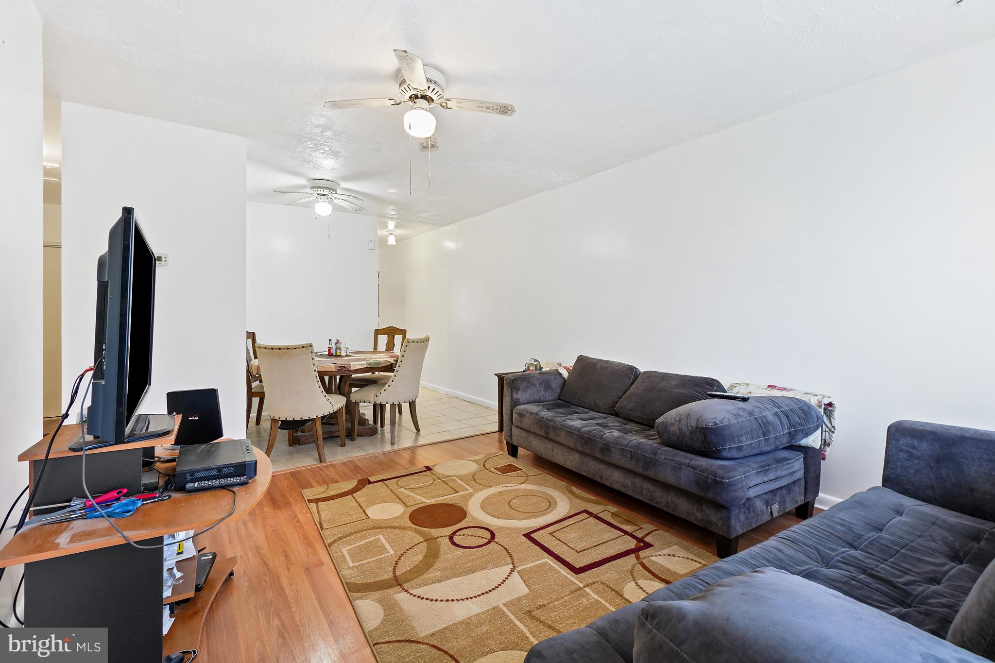 7523 Greenleaf Road Landover, MD 20785 - Photo 15 of 30 a living room with furniture and a flat screen tv