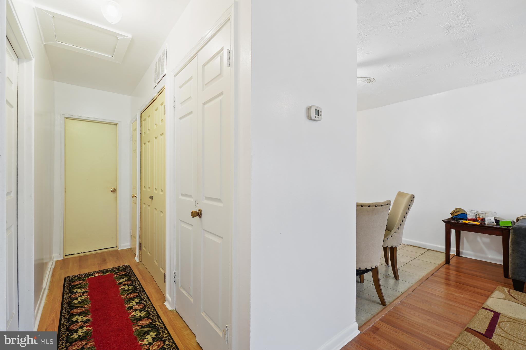 7523 Greenleaf Road Landover, MD 20785 - Photo 17 of 30 a view of room with wooden floor and furniture
