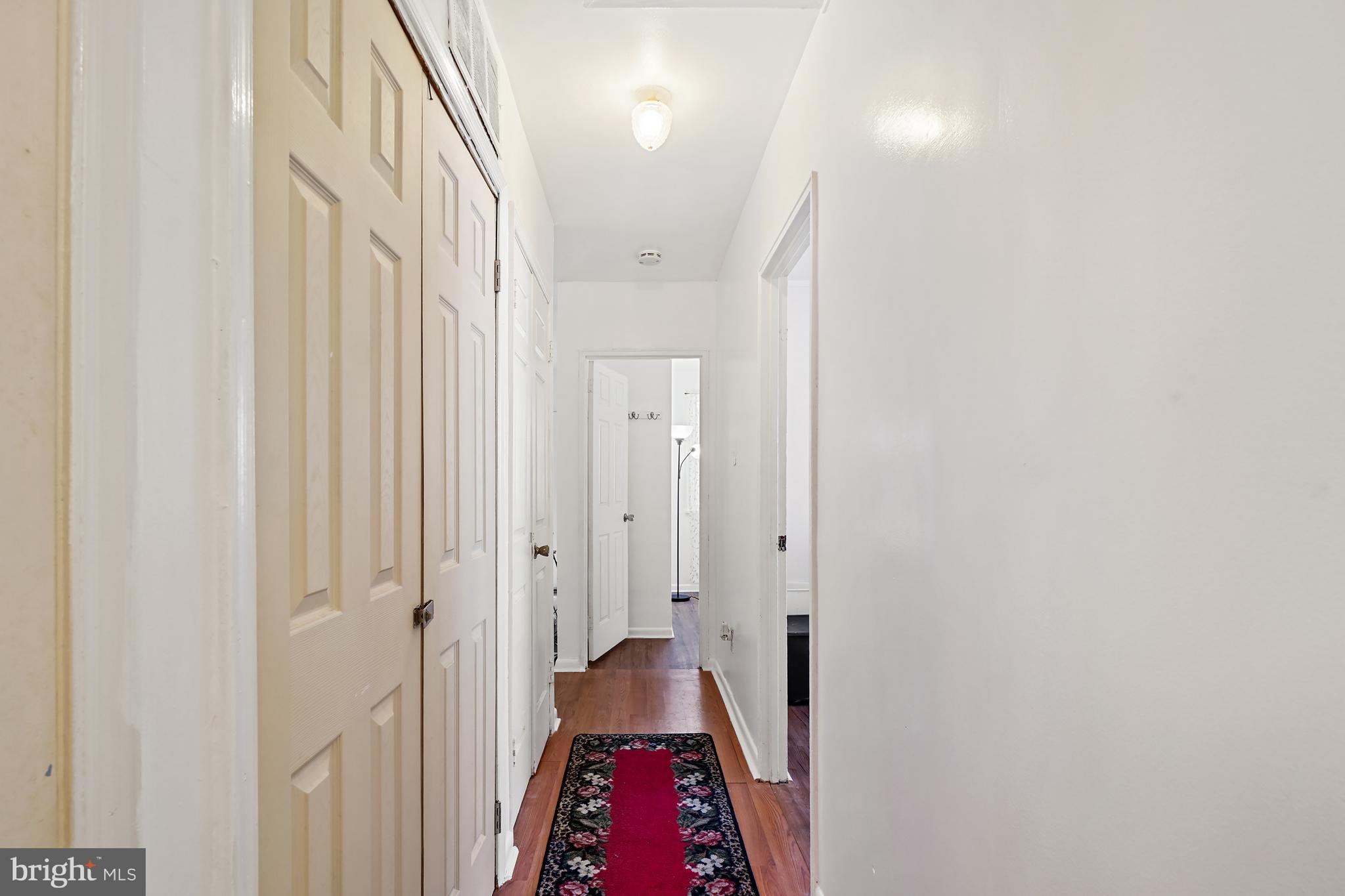 7523 Greenleaf Road Landover, MD 20785 - Photo 24 of 30 a view of hallway with closet and wooden floor
