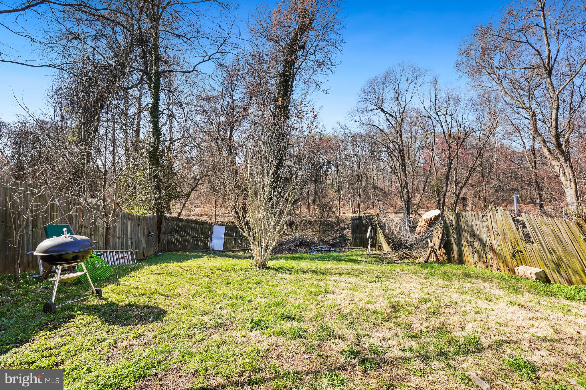 7523 Greenleaf Road Landover, MD 20785 - Photo 26 of 30 a backyard of a house with table and chairs
