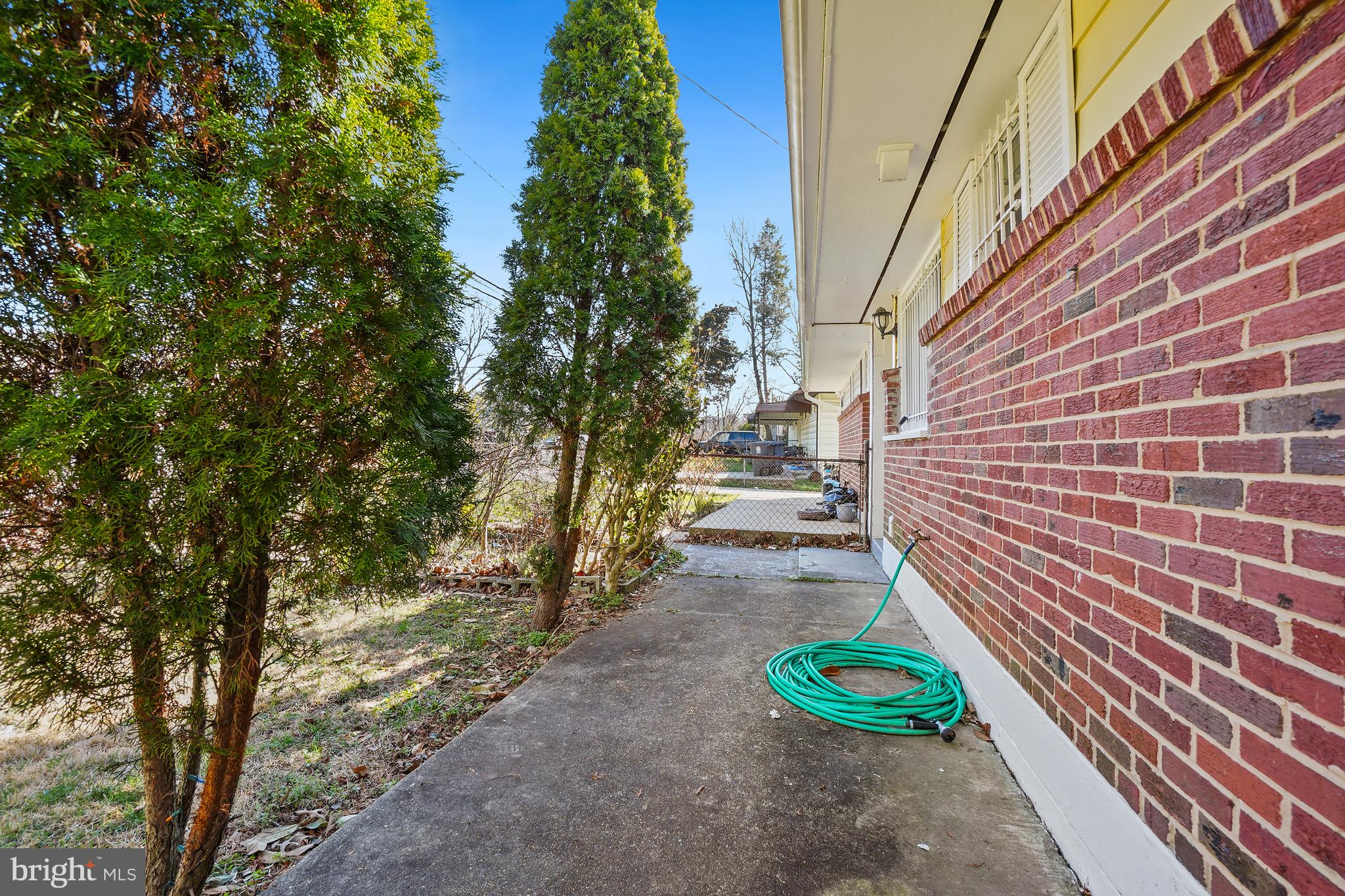 7523 Greenleaf Road Landover, MD 20785 - Photo 28 of 30 a pathway of a house with a yard