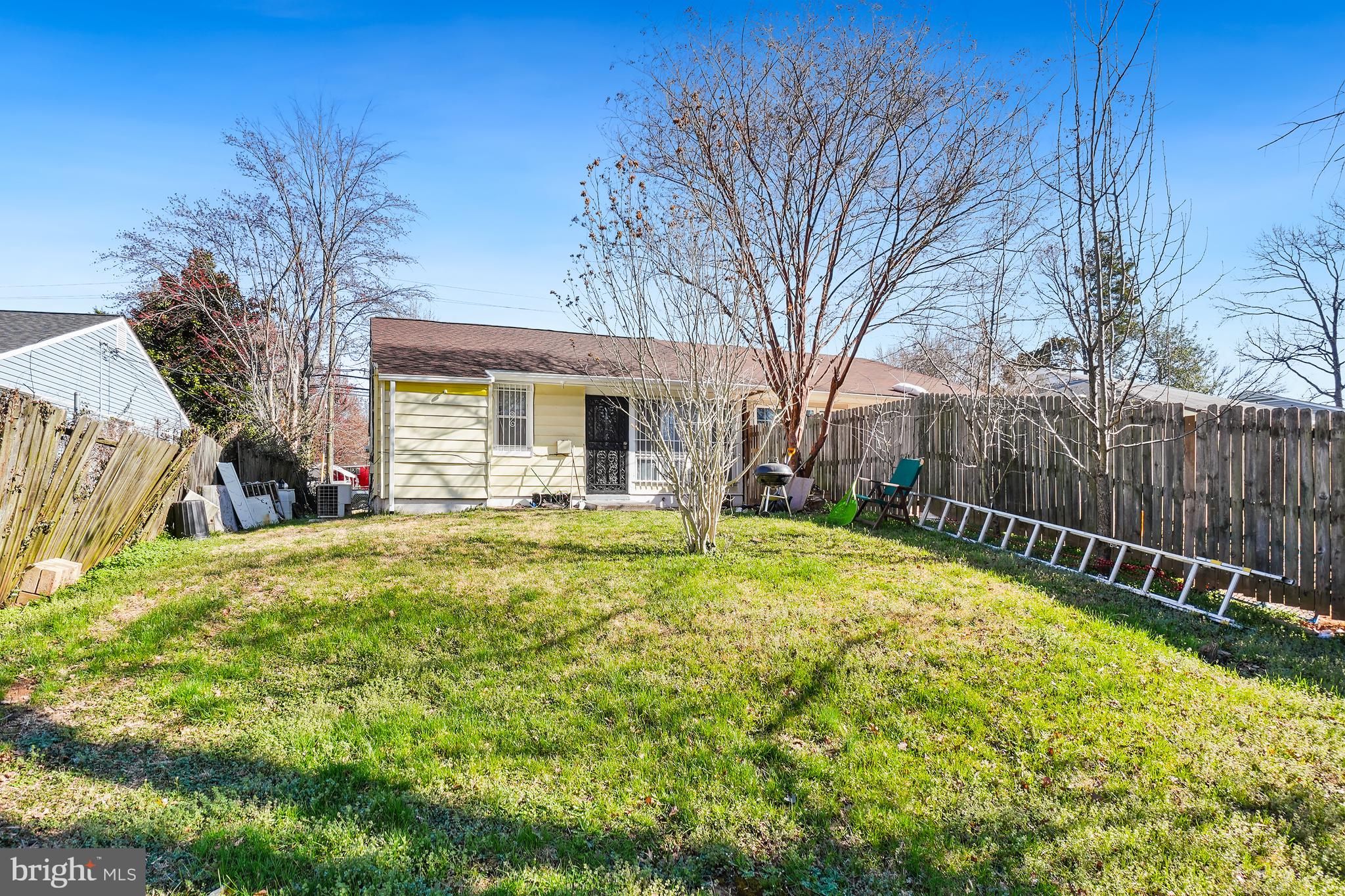 7523 Greenleaf Road Landover, MD 20785 - Photo 30 of 30 a backyard of a house with table and chairs