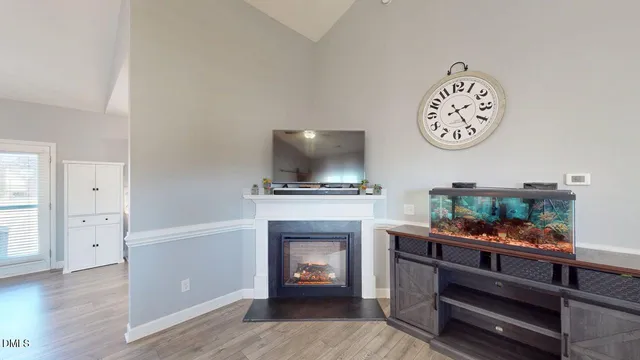 a bed room with a bed and a television