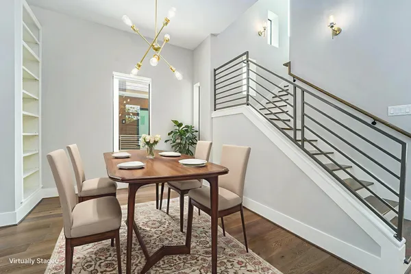 a view of a dining room with furniture