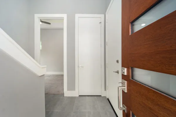 a view of hallway with stairs