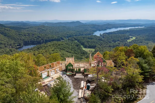 a view of a large building with a mountain