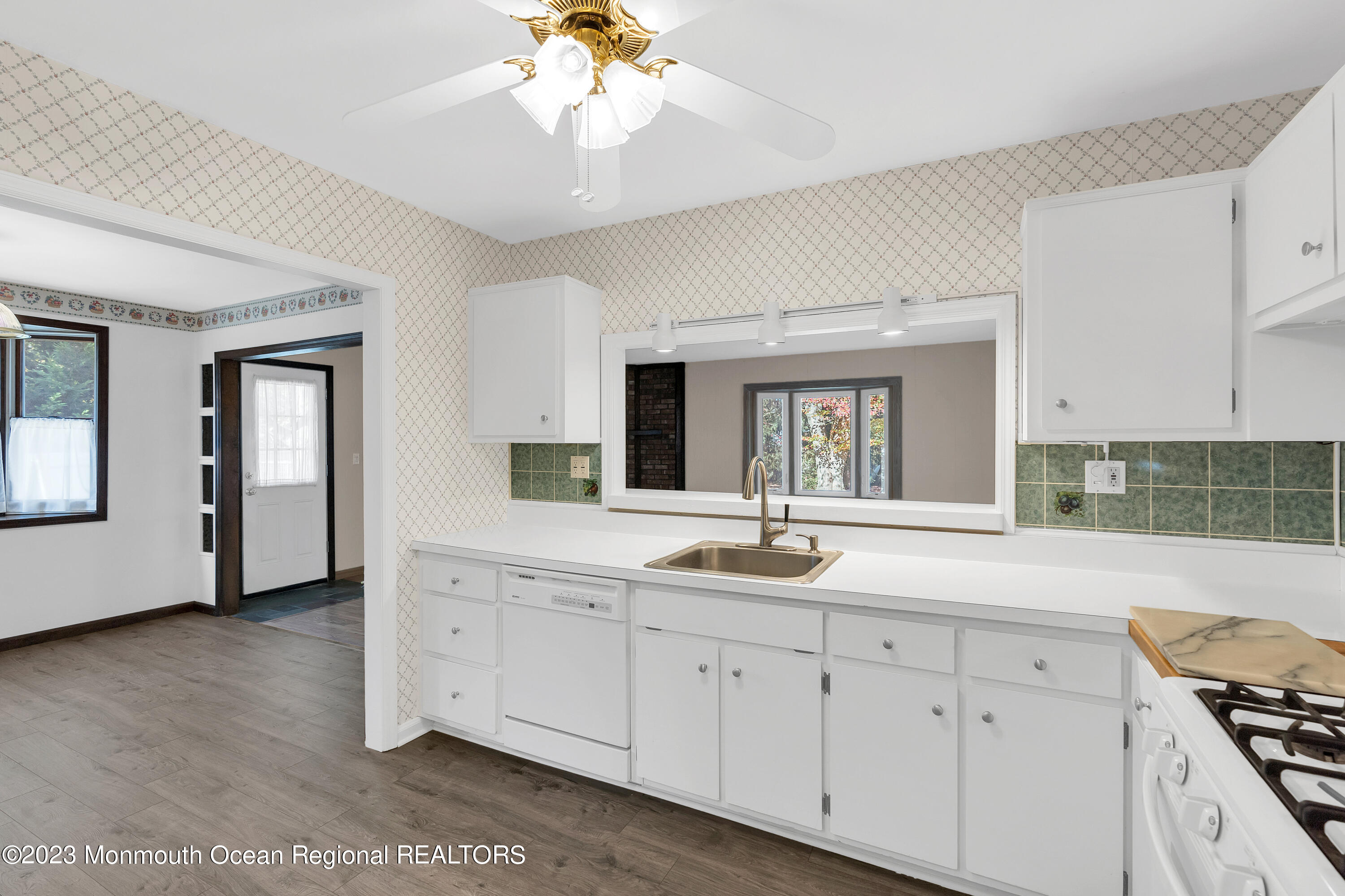 14 Daniel Drive Matawan, NJ 07747 - Photo 13 of 48 a spacious en suite bathroom with a granite countertop sink and mirror