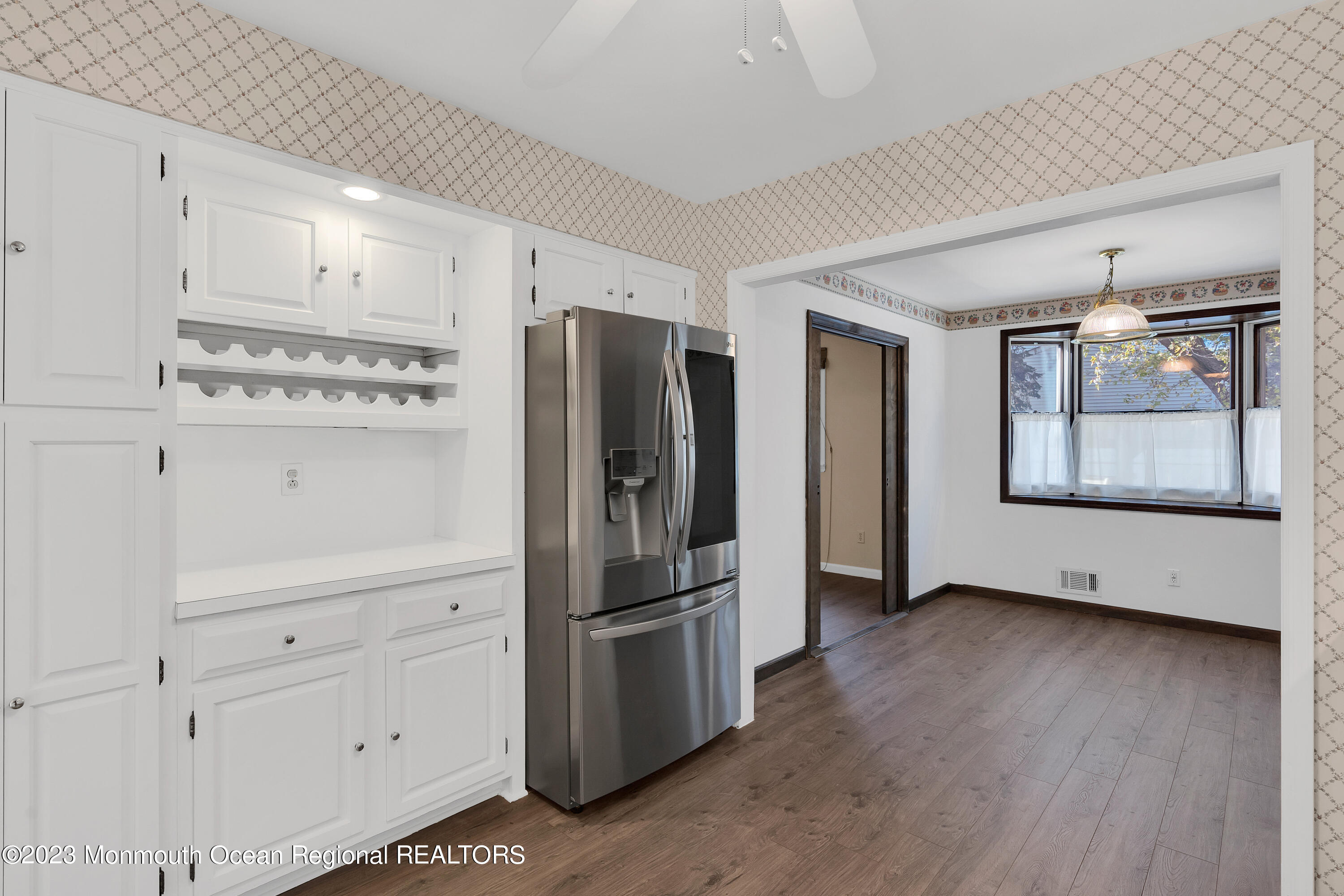 14 Daniel Drive Matawan, NJ 07747 - Photo 14 of 48 a kitchen with stainless steel appliances a refrigerator and wooden floor