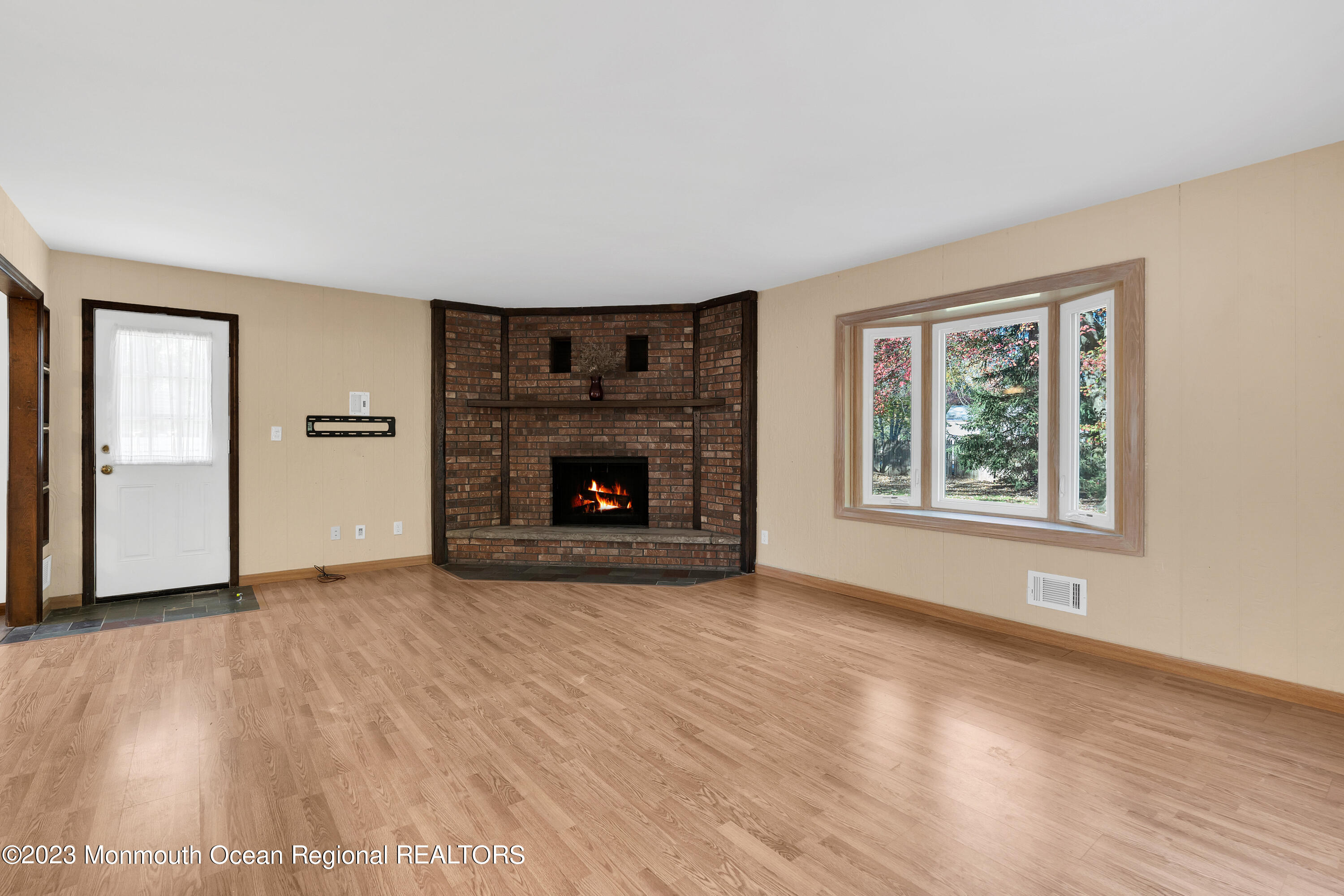 14 Daniel Drive Matawan, NJ 07747 - Photo 22 of 48 a view of an empty room with window and fire place