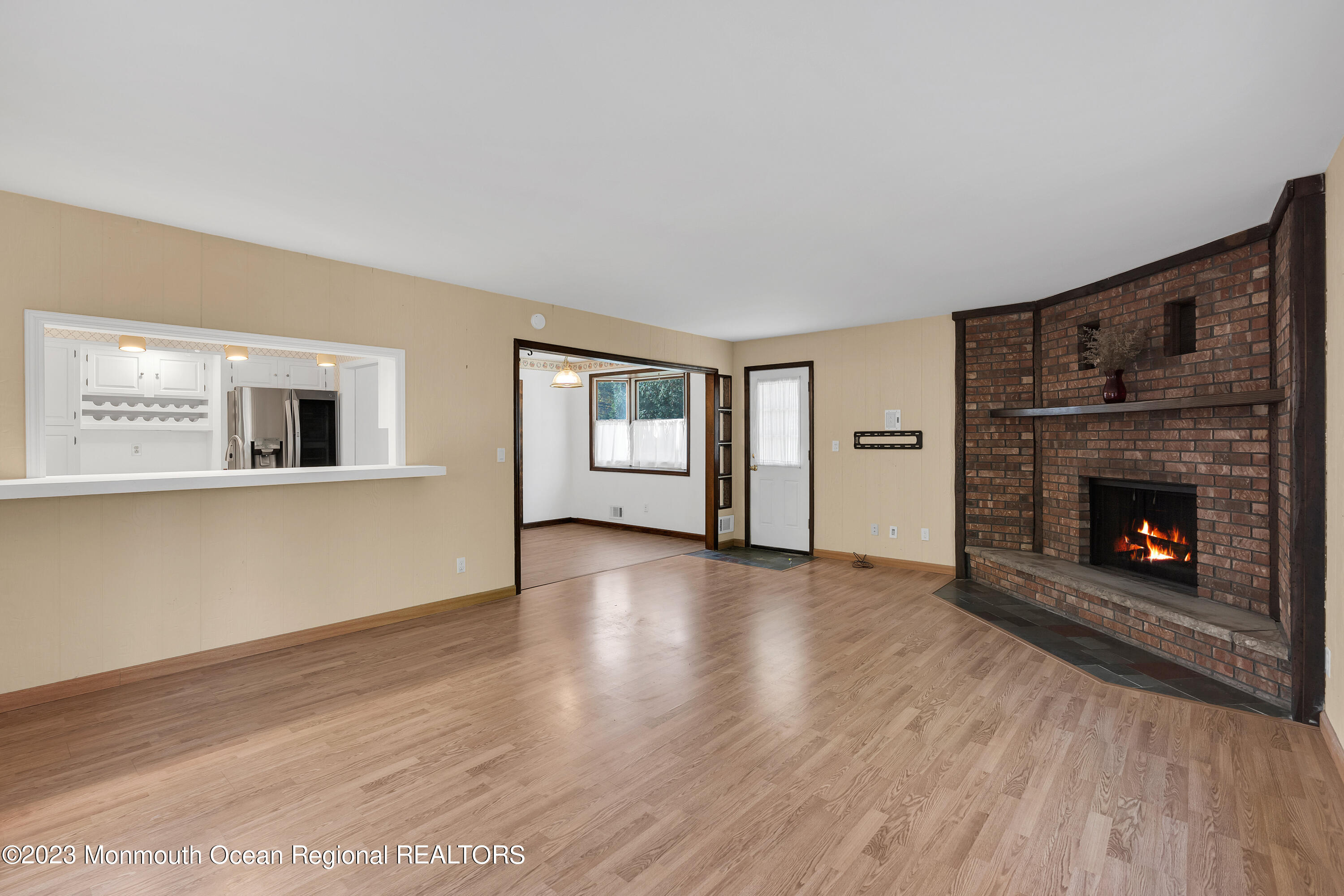 14 Daniel Drive Matawan, NJ 07747 - Photo 23 of 48 a view of an empty room with a fireplace and a window