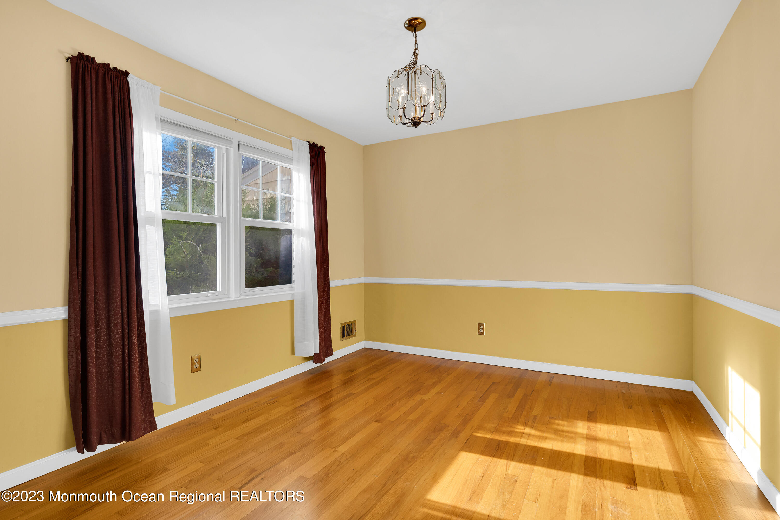 14 Daniel Drive Matawan, NJ 07747 - Photo 5 of 48 a view of an empty room with a window