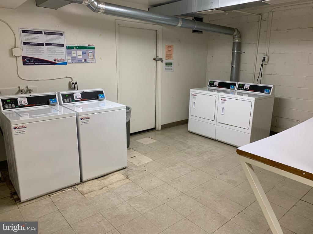 2911 Charing Cross Road, Unit 10 Falls Church, VA 22042 - Photo 22 of 25 a utility room with dryer and washer