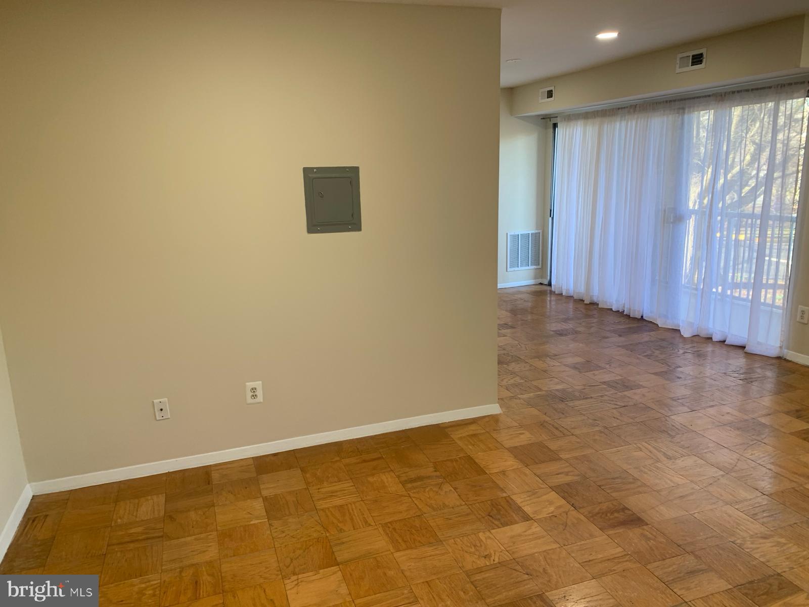 2911 Charing Cross Road, Unit 10 Falls Church, VA 22042 - Photo 3 of 25 a view of an empty room with a window