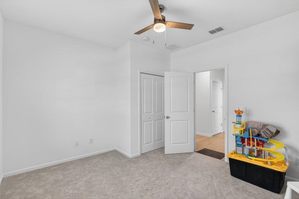 210 White Rabbit Run St. Augustine, FL 32092 - Photo 54 of 85 a view of room with toys and ceiling fan