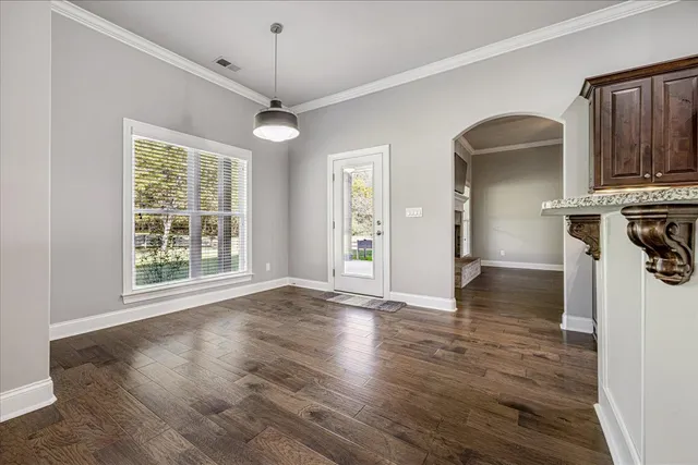 a view of livingroom with furniture wooden floor and window