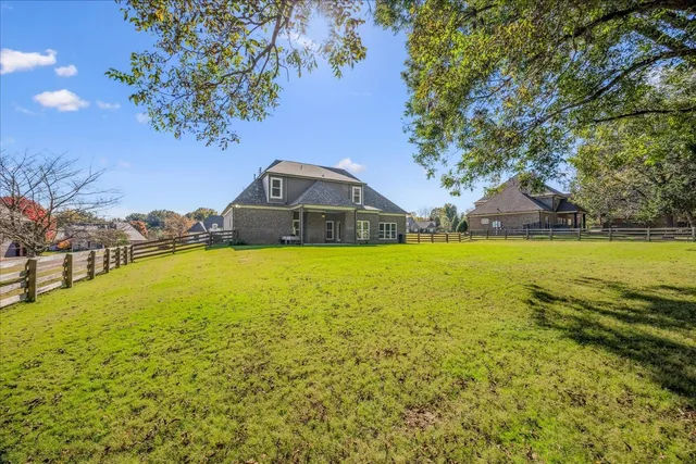 a view of a swimming pool with an ocean view