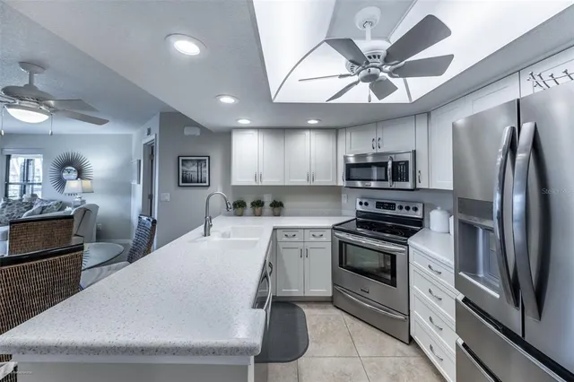 a view of a workspace with furniture