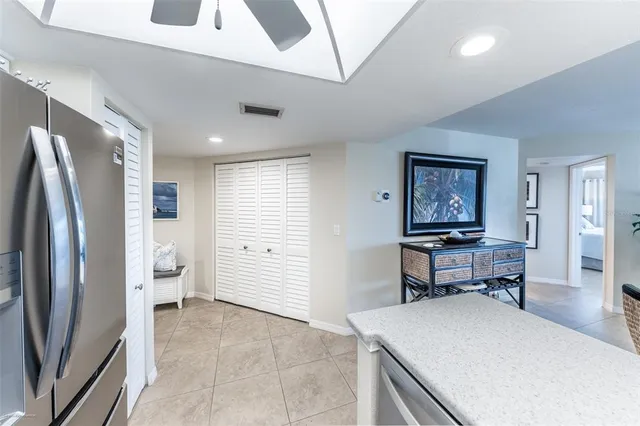 a room with furniture and a flat screen tv