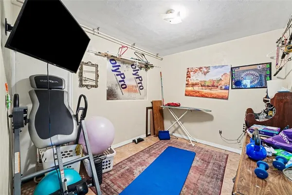 a room with furniture and wooden floor