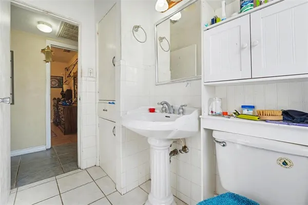 a bathroom with a sink and a shower