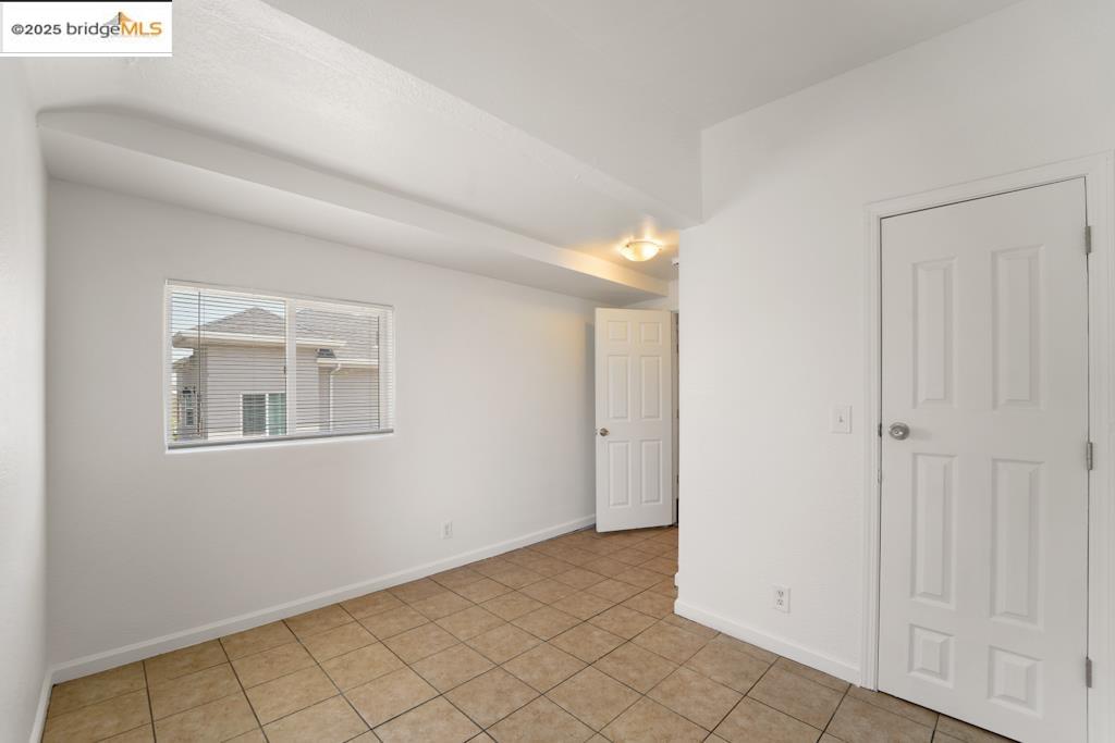 203 Bissell Avenue Richmond, CA 94801 - Photo 13 of 30 a view of an empty room with window