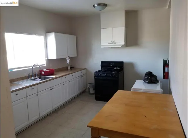 a view of a house with a snow in the background