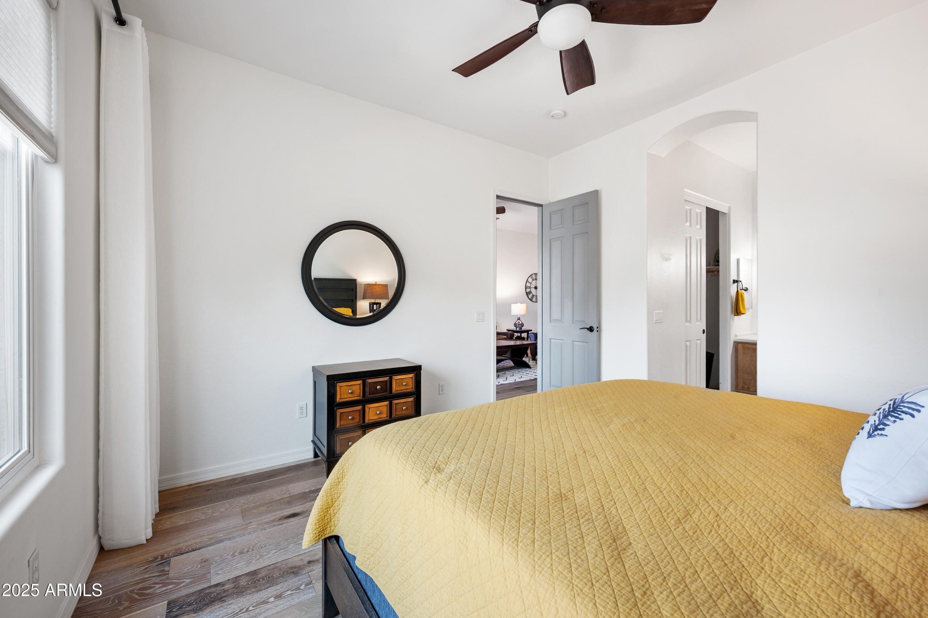 10172 East Dinosaur Ridge Road Gold Canyon, AZ 85118 - Photo 15 of 38 a bedroom with a bed and a mirror on dresser