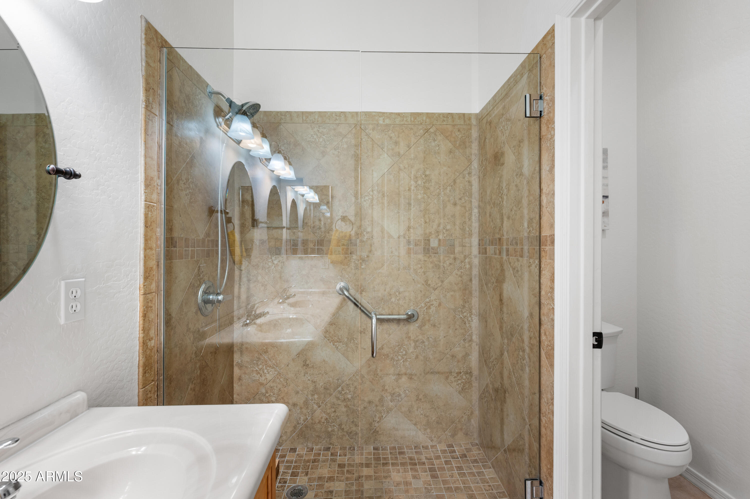10172 East Dinosaur Ridge Road Gold Canyon, AZ 85118 - Photo 18 of 38 a bathroom with a shower and a toilet