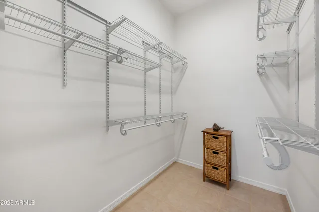 a view of a bathroom with bathtub and shower